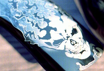 skull and tribal graphics on front fender