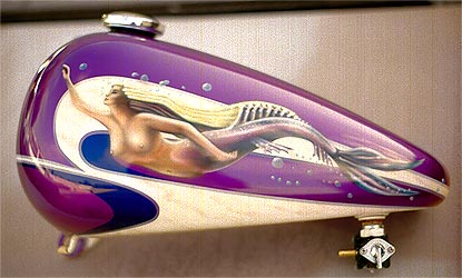 graphics and mermaid on Harley Davidson motorcycle tank