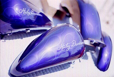 thin ghost flames and hand lettering on candy purple motorcycle