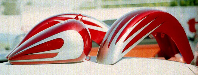 silver scallops on candy red motorcycle parts