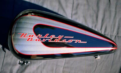 vintage scallopes on black Harley Davidson motorcycle tank